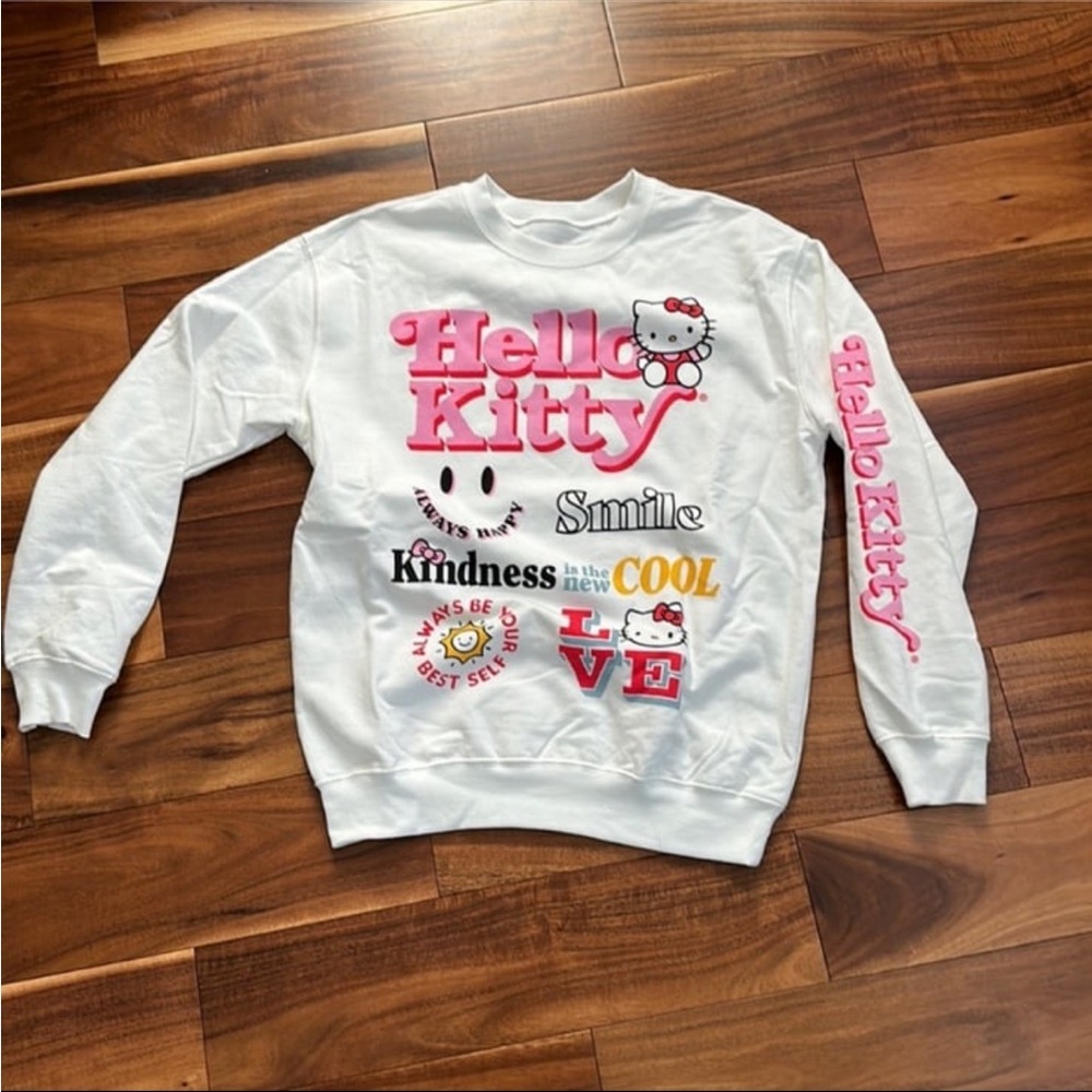 HELLO KITTY SMILE KINDNESS LOVE WHITE GRAPHIC SWEATSHIRT XSMALL